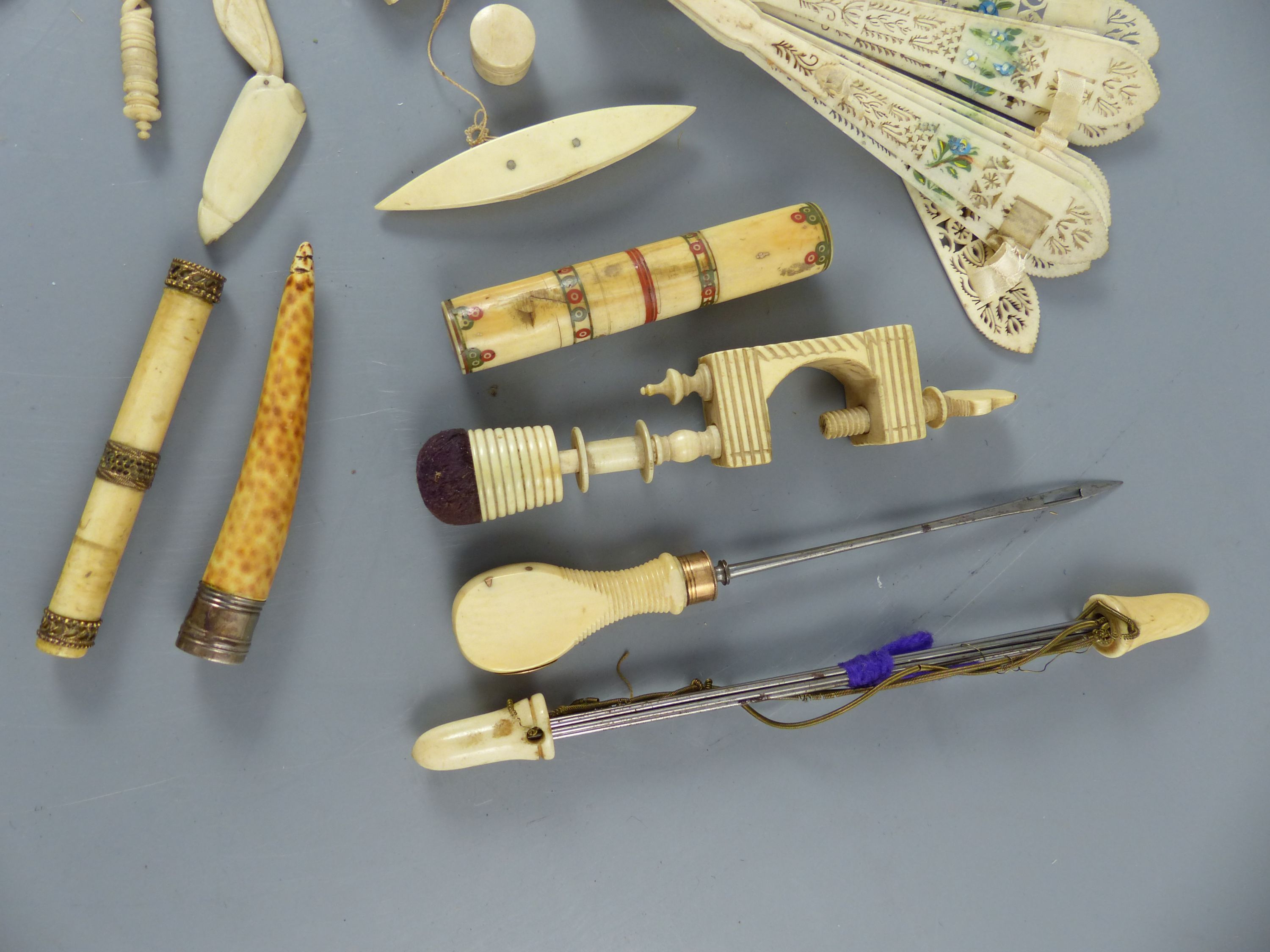 A group of assorted 19th century ivory sewing implements and objets dart